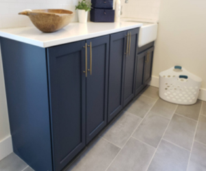 Dark Blue Cabinets in Bathroom After a Kitchen Cabinet Design in Brighton, MI