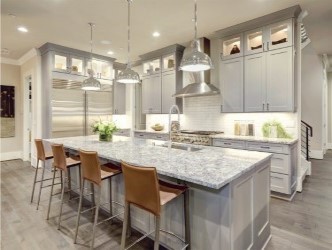 White Countertops with wood floors 