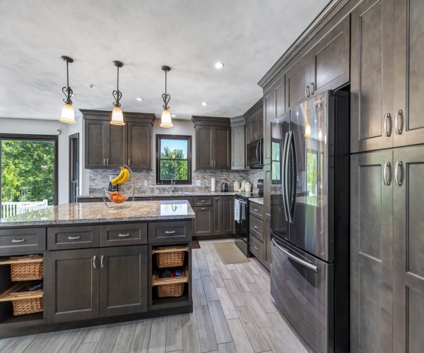 Modern Kitchen With dark cabinets 