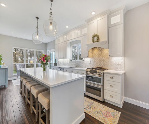 White Countertops with wood floors 